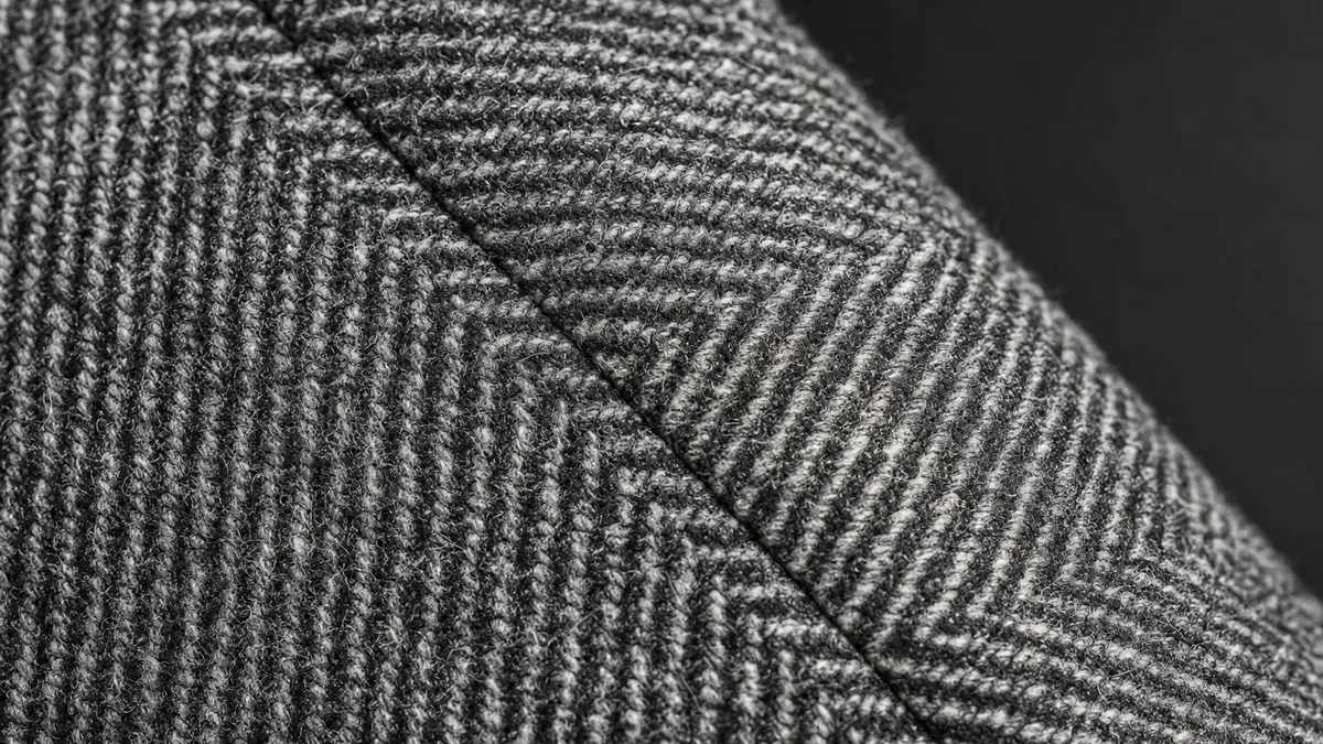 Macro detail of an item: clean factory workmanship — even stitching, tidy edges